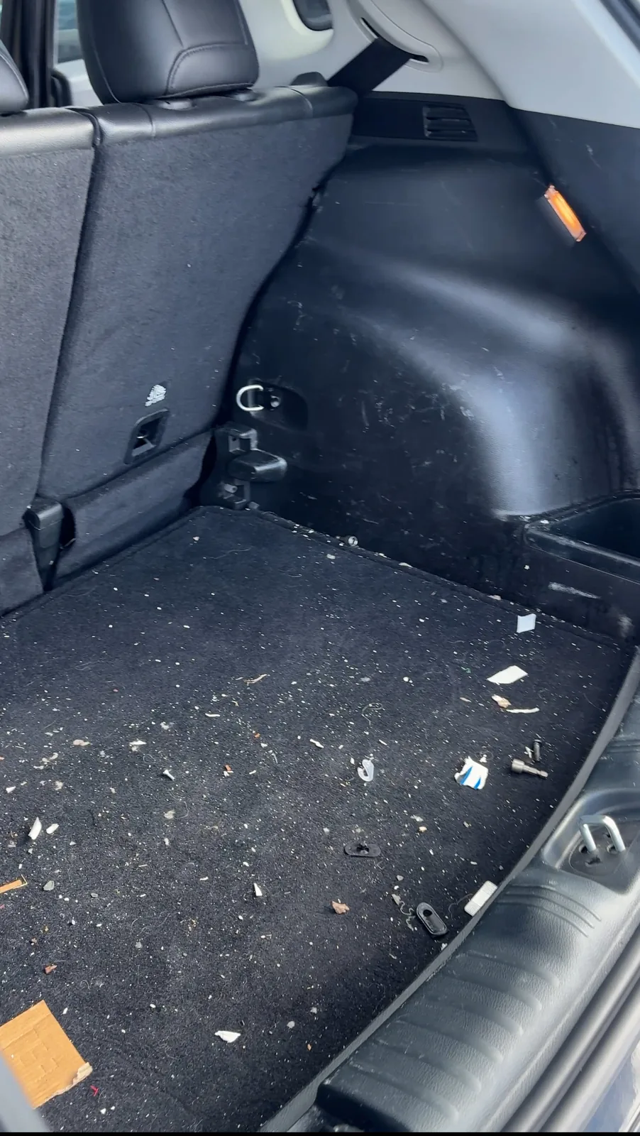 Dirty SUV cargo area before interior detail