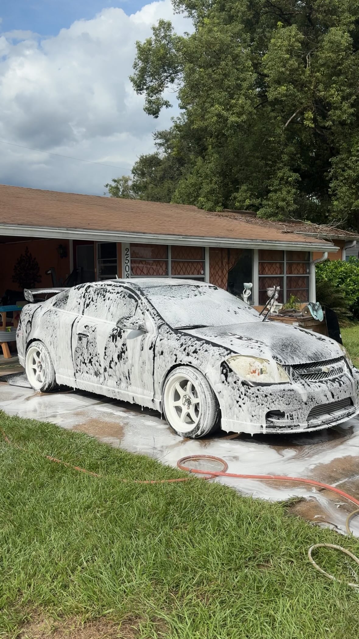 White Sedan Lawn Foam